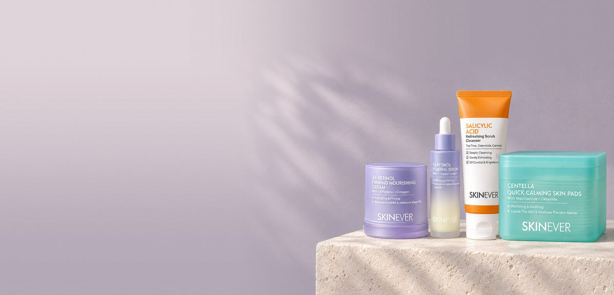 3A Renewal Cream, Renewal Serum, Purifying Cleanser och Centella Calming Pads på en kalkstenshylla